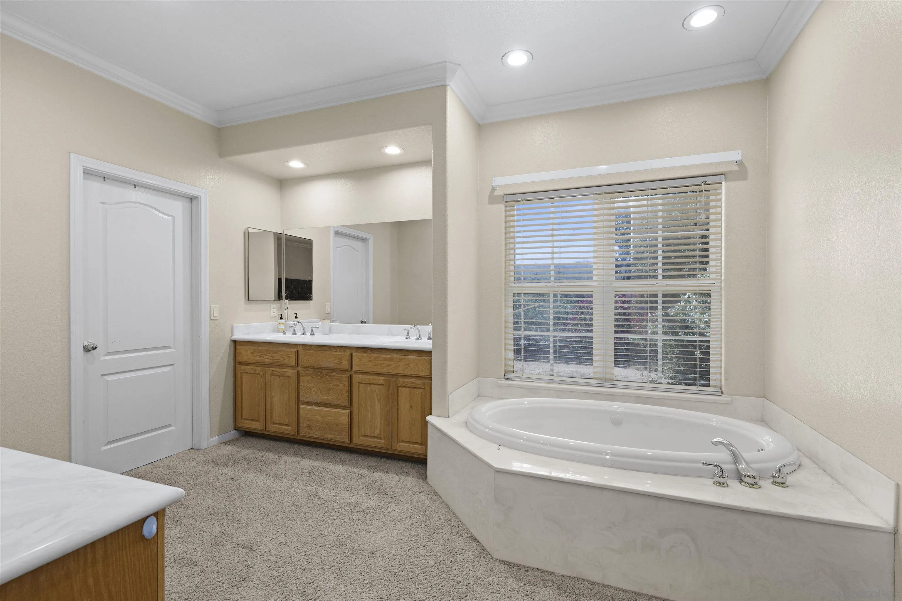 24849 Pappas Road Ramona, CA 92065 - Photo 18 of 50 a spacious bathroom with sink shower bathtub and mirror
