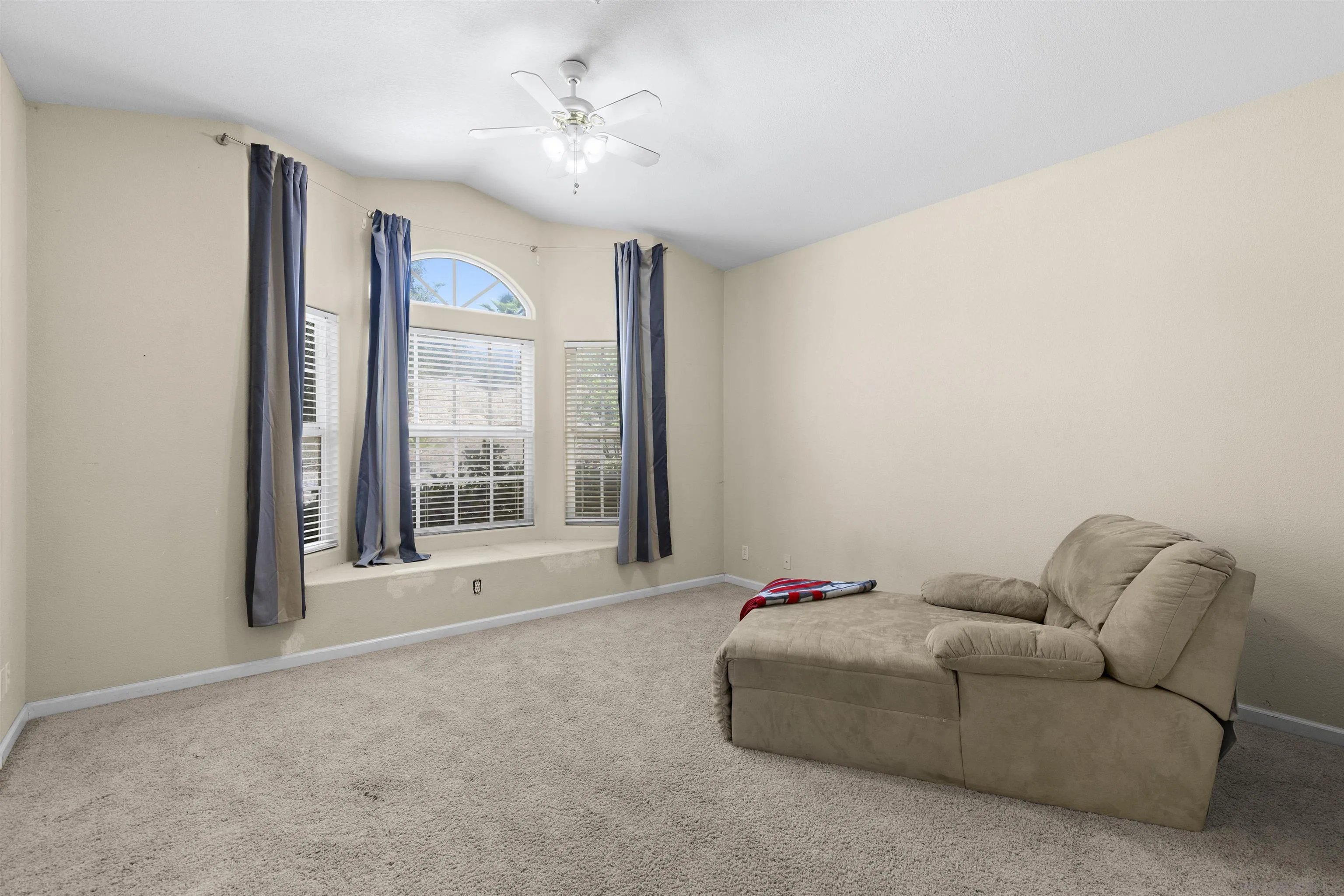 24849 Pappas Road Ramona, CA 92065 - Photo 21 of 50 a living room with furniture and a large window
