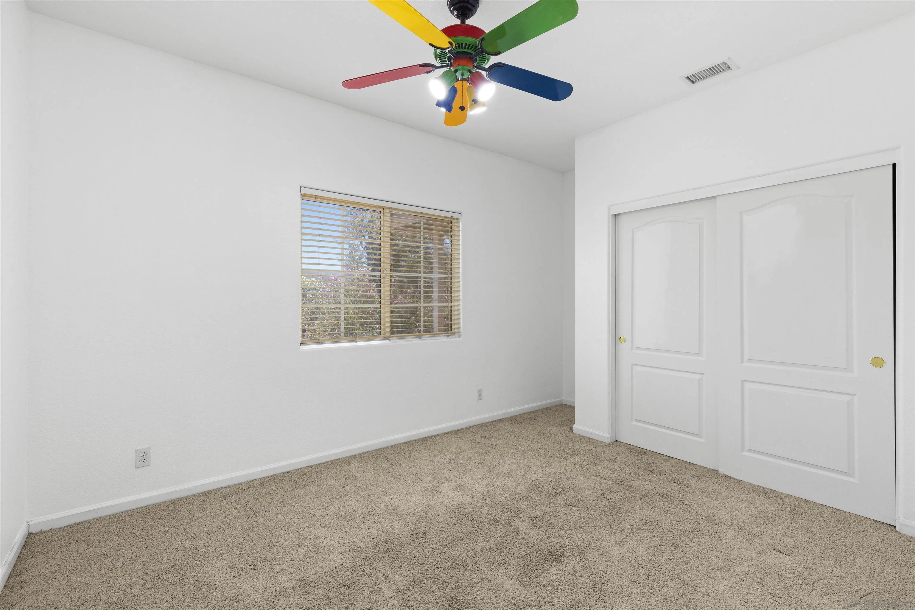 24849 Pappas Road Ramona, CA 92065 - Photo 26 of 50 an empty room with windows and ceiling fan
