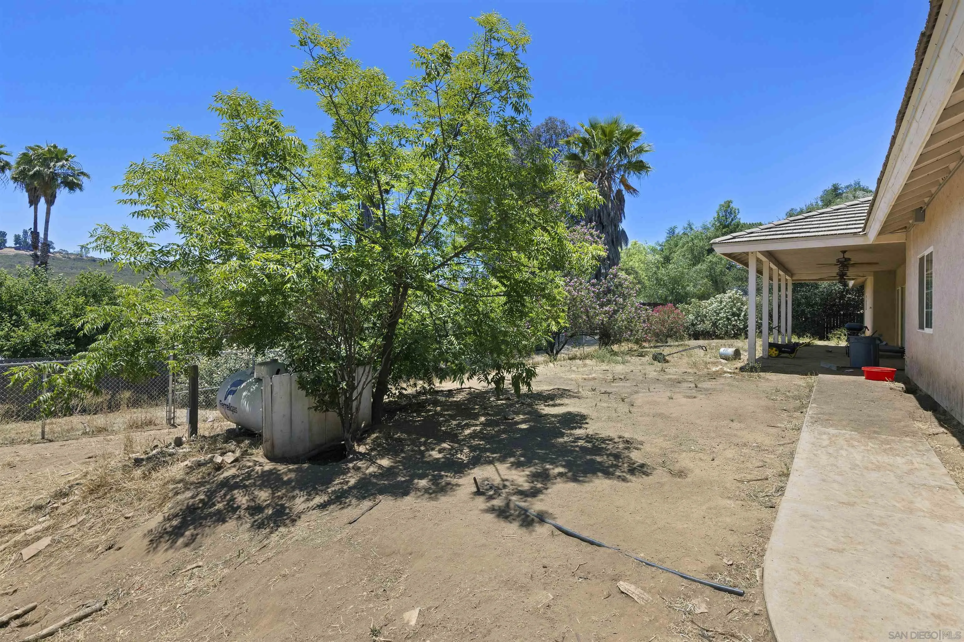 24849 Pappas Road Ramona, CA 92065 - Photo 35 of 50 a view of a backyard with sitting area