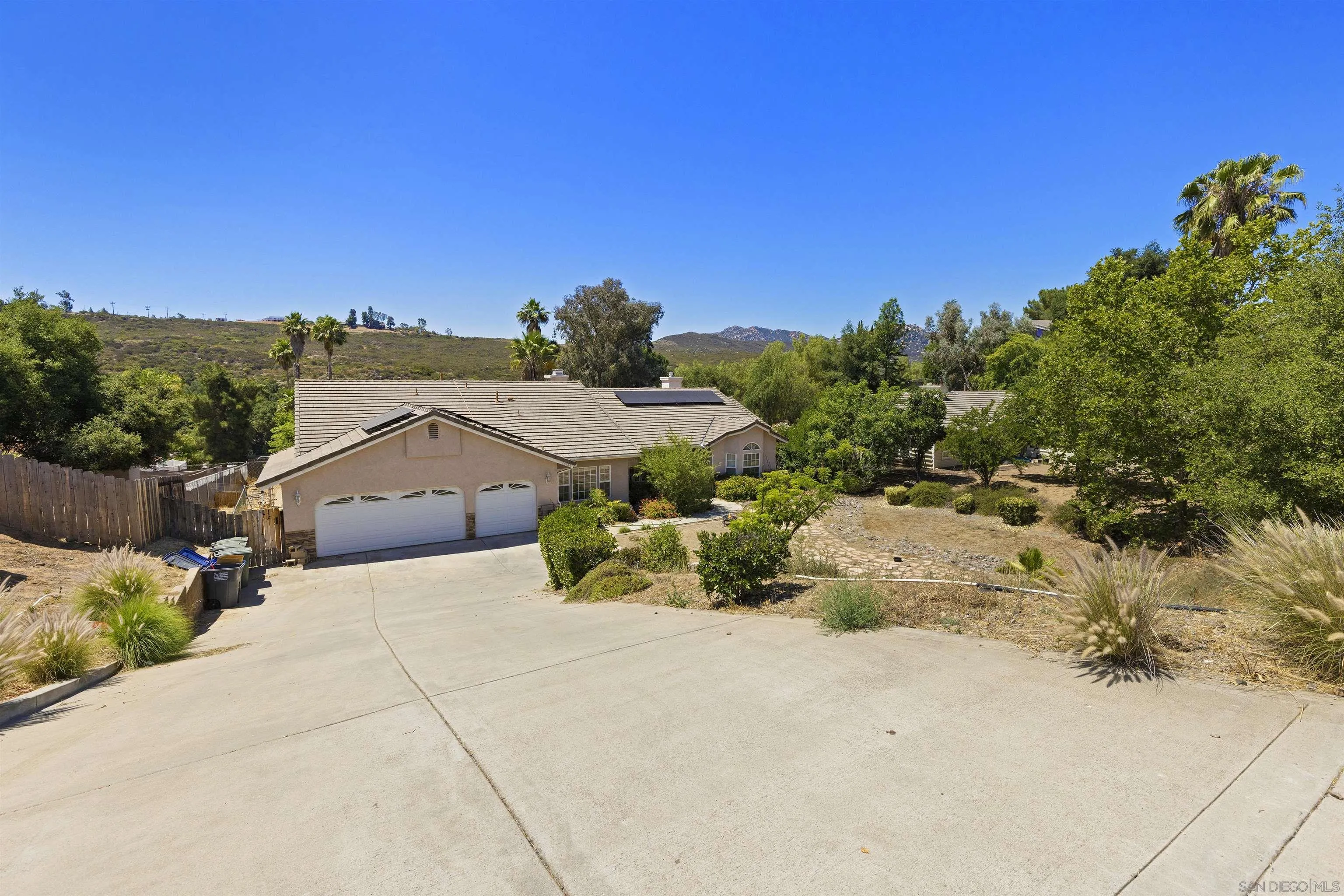 24849 Pappas Road Ramona, CA 92065 - Photo 36 of 50 a picture of a houses with a yard