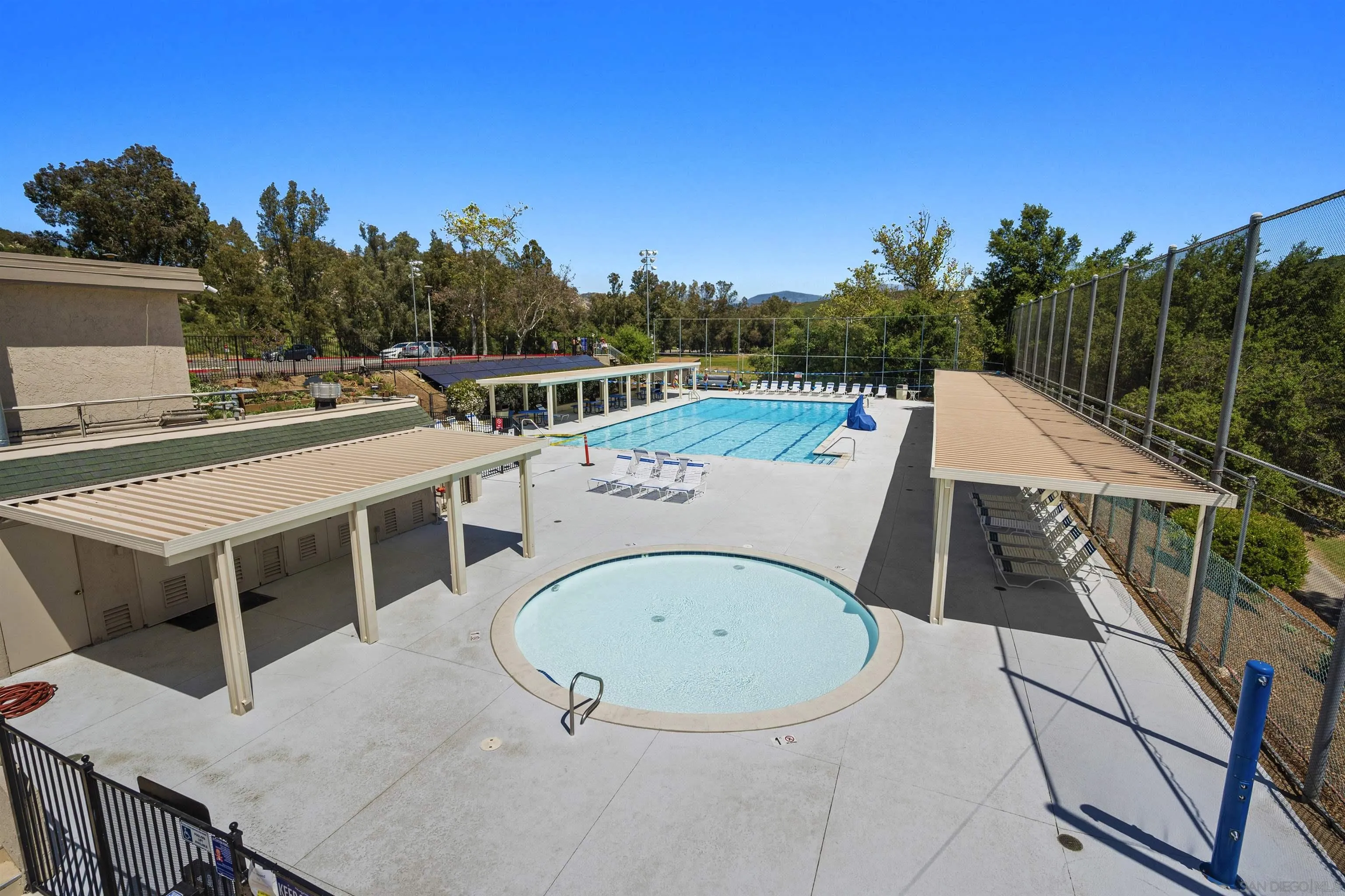 24849 Pappas Road Ramona, CA 92065 - Photo 38 of 50 a view of a balcony with furniture and a garden