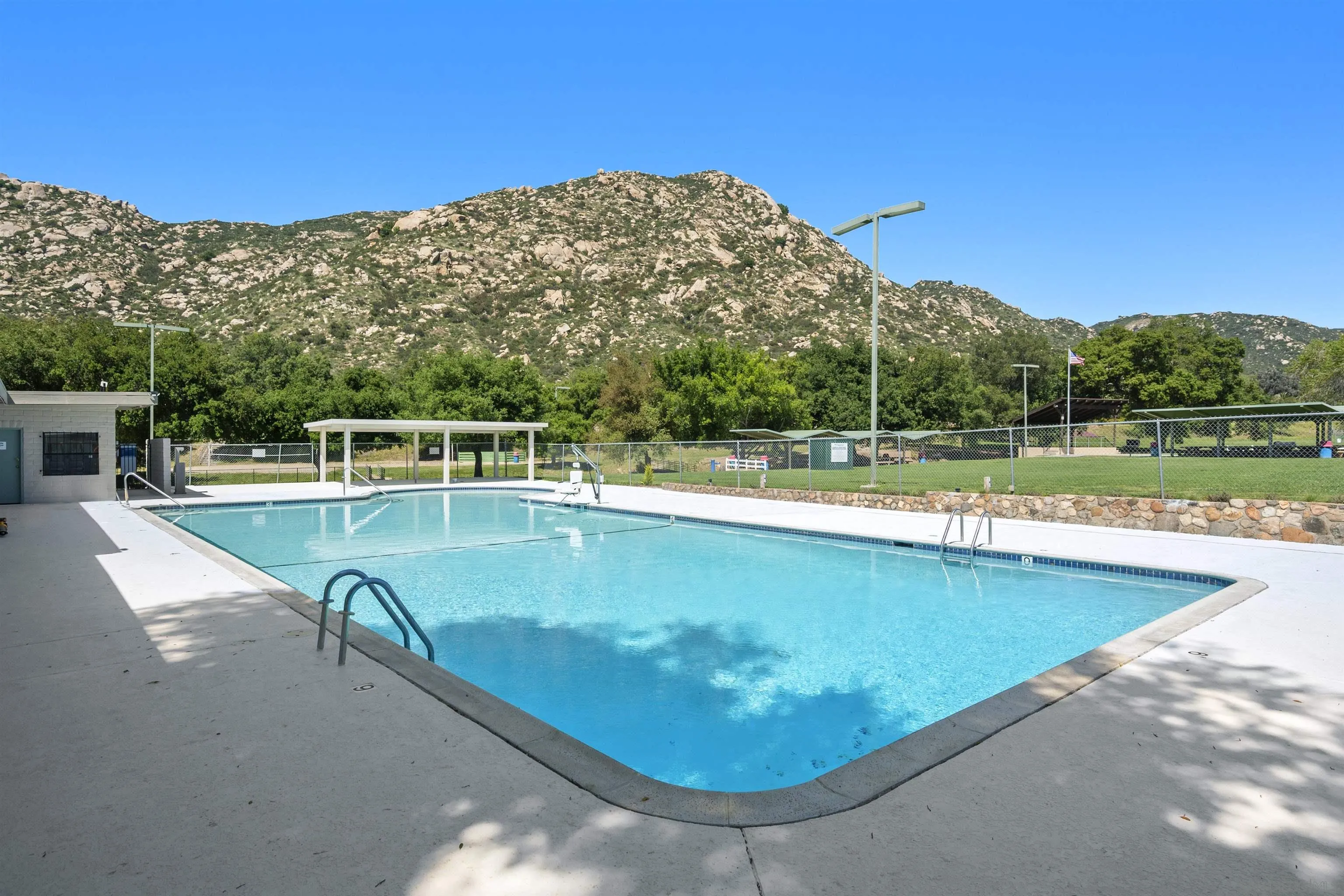 24849 Pappas Road Ramona, CA 92065 - Photo 39 of 50 a view of a swimming pool with a yard