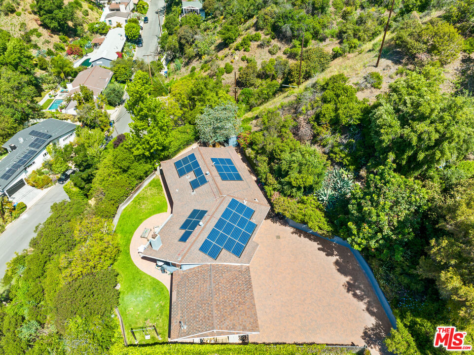 3940 Mandeville Canyon Road Los Angeles, CA 90049 - Photo 43 of 54 a view of outdoor space and yard