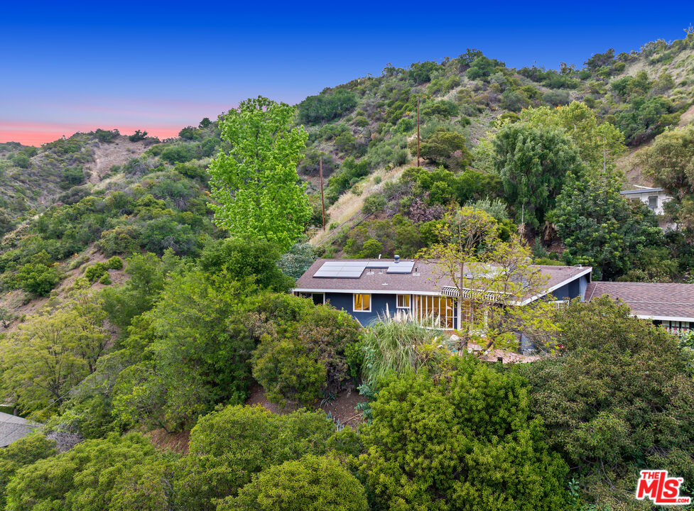 3940 Mandeville Canyon Road Los Angeles, CA 90049 - Photo 51 of 54 an aerial view of a house