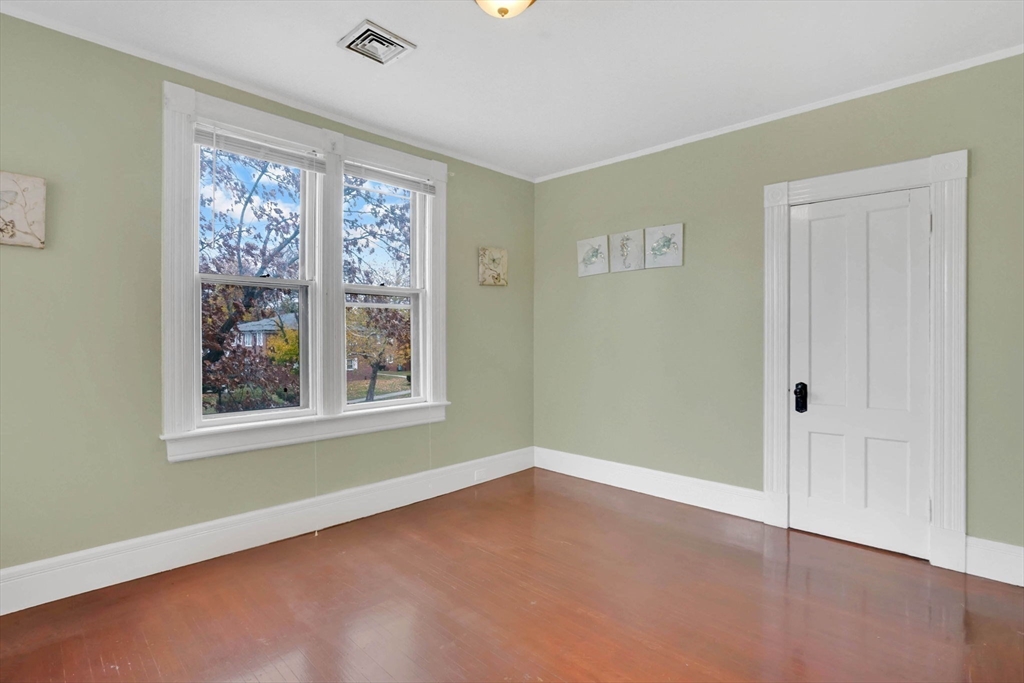 55 Florida Street Springfield, MA 01109 - Photo 26 of 42 a view of an empty room with a window