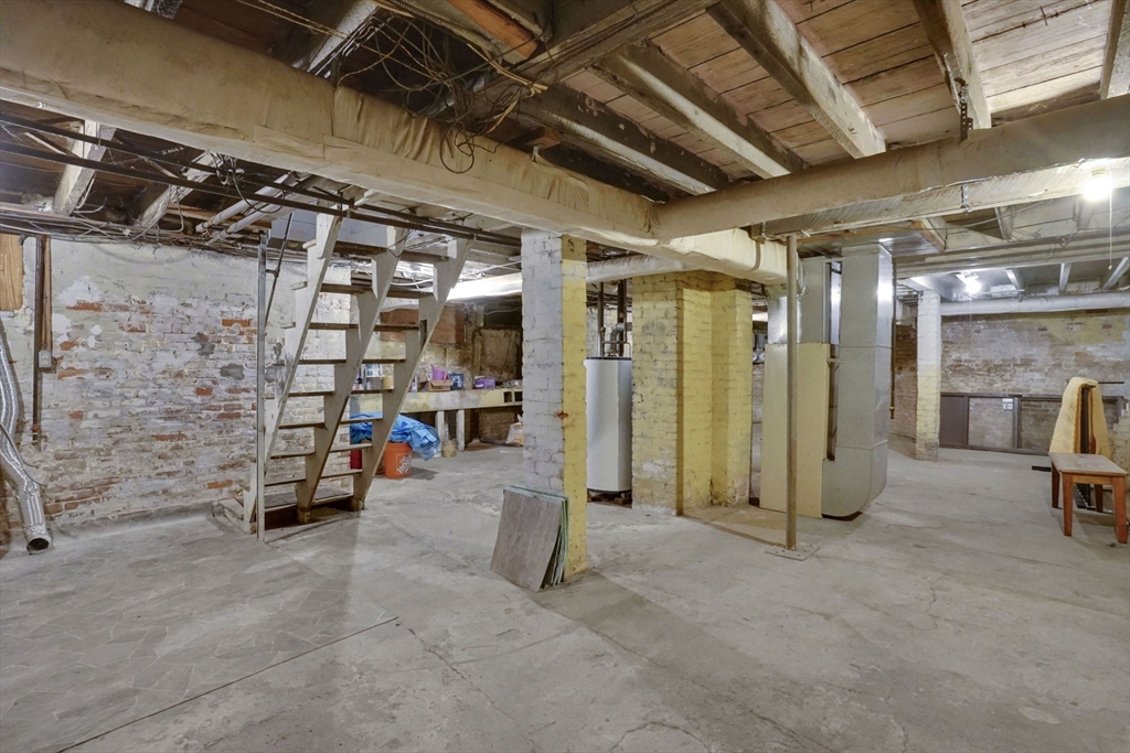 55 Florida Street Springfield, MA 01109 - Photo 34 of 42 a view of parking garage with cars