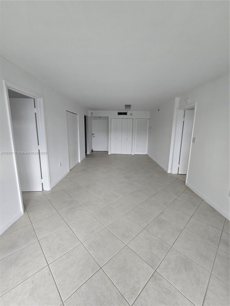 1775 Washington Avenue, Unit 4G Miami Beach, FL 33139 - Photo 14 of 44 a view of an empty room and entryway
