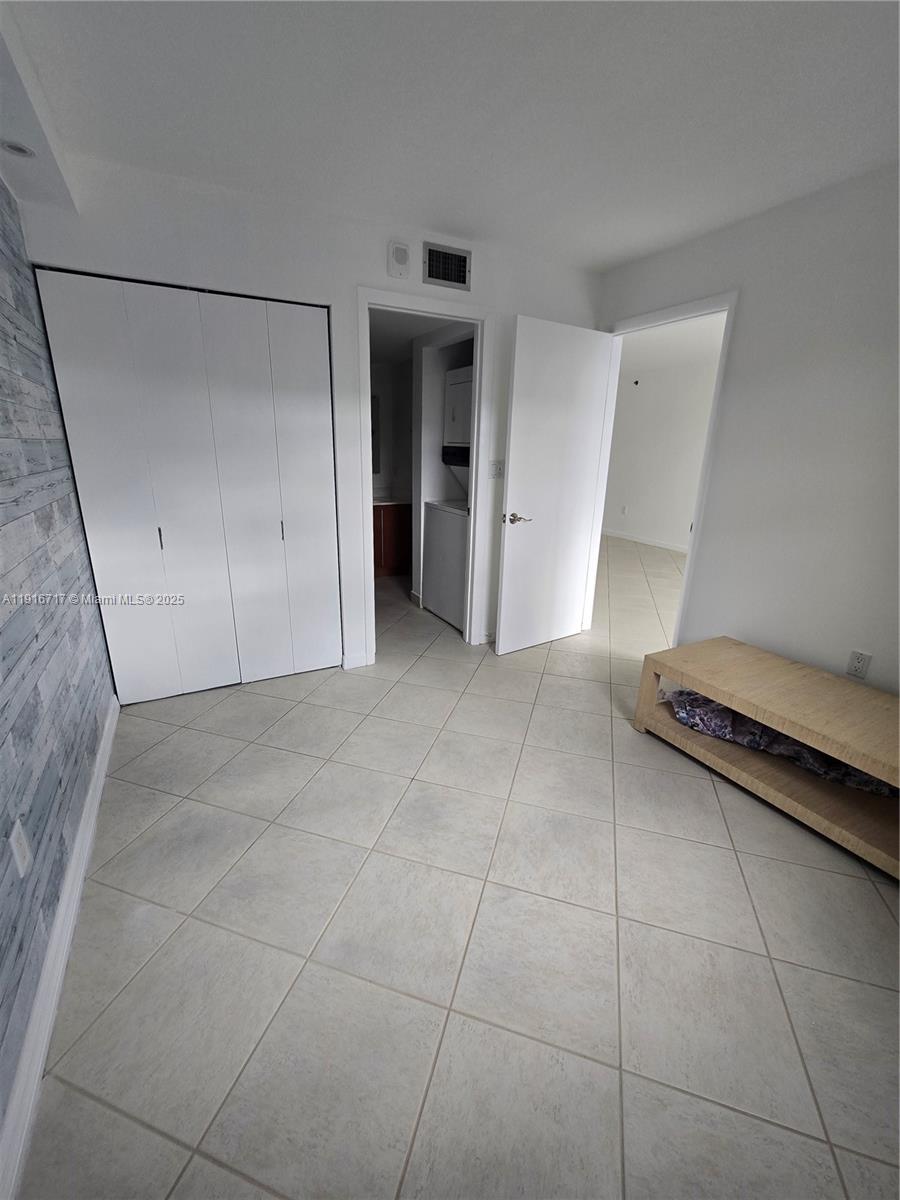 1775 Washington Avenue, Unit 4G Miami Beach, FL 33139 - Photo 16 of 44 a view of a livingroom with an empty space and a sink window