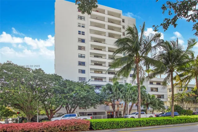 a front view of a building with street view