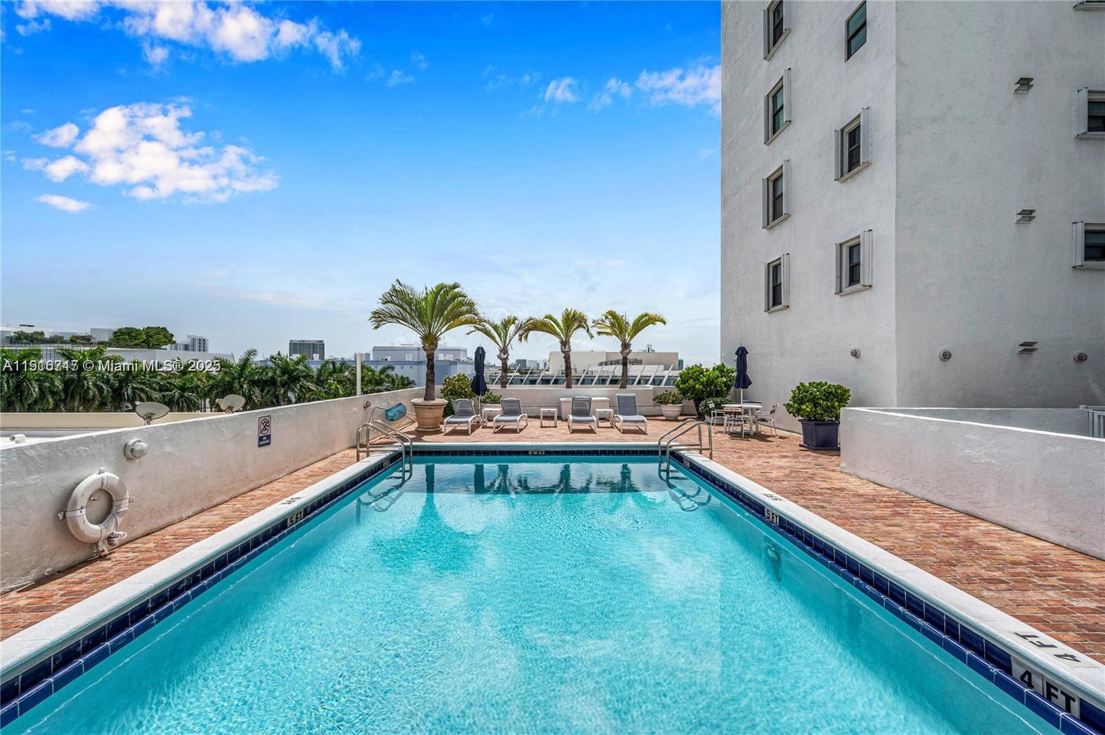 1775 Washington Avenue, Unit 4G Miami Beach, FL 33139 - Photo 41 of 44 a view of swimming pool from a balcony
