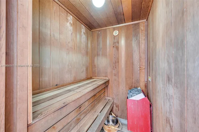 a bathroom with a shower curtain and a curtain
