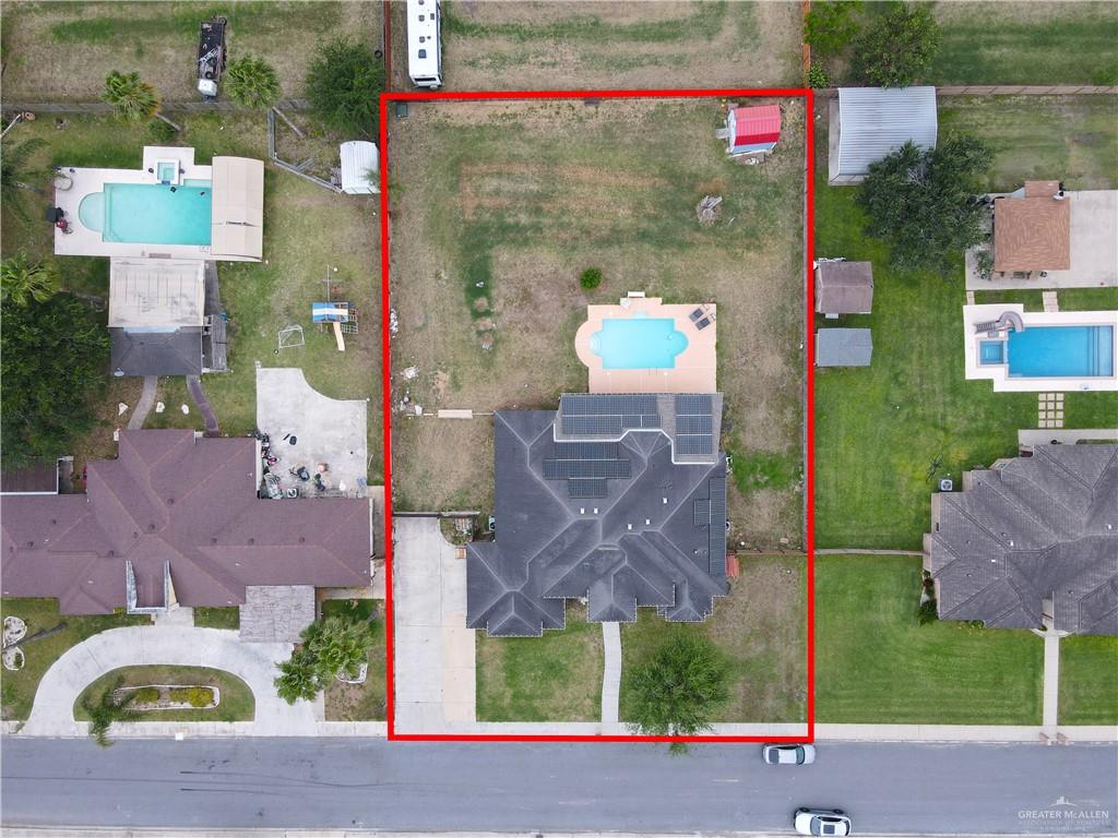 2005 Stuart Road Weslaco, TX 78599 - Photo 30 of 30 an aerial view of multiple houses with a yard
