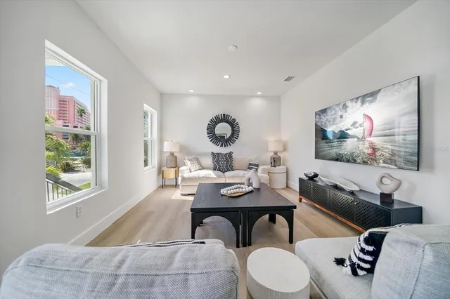 a large kitchen with kitchen island a large counter top