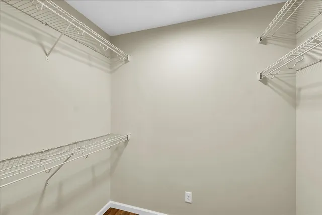 a view of a room with racks on the wall