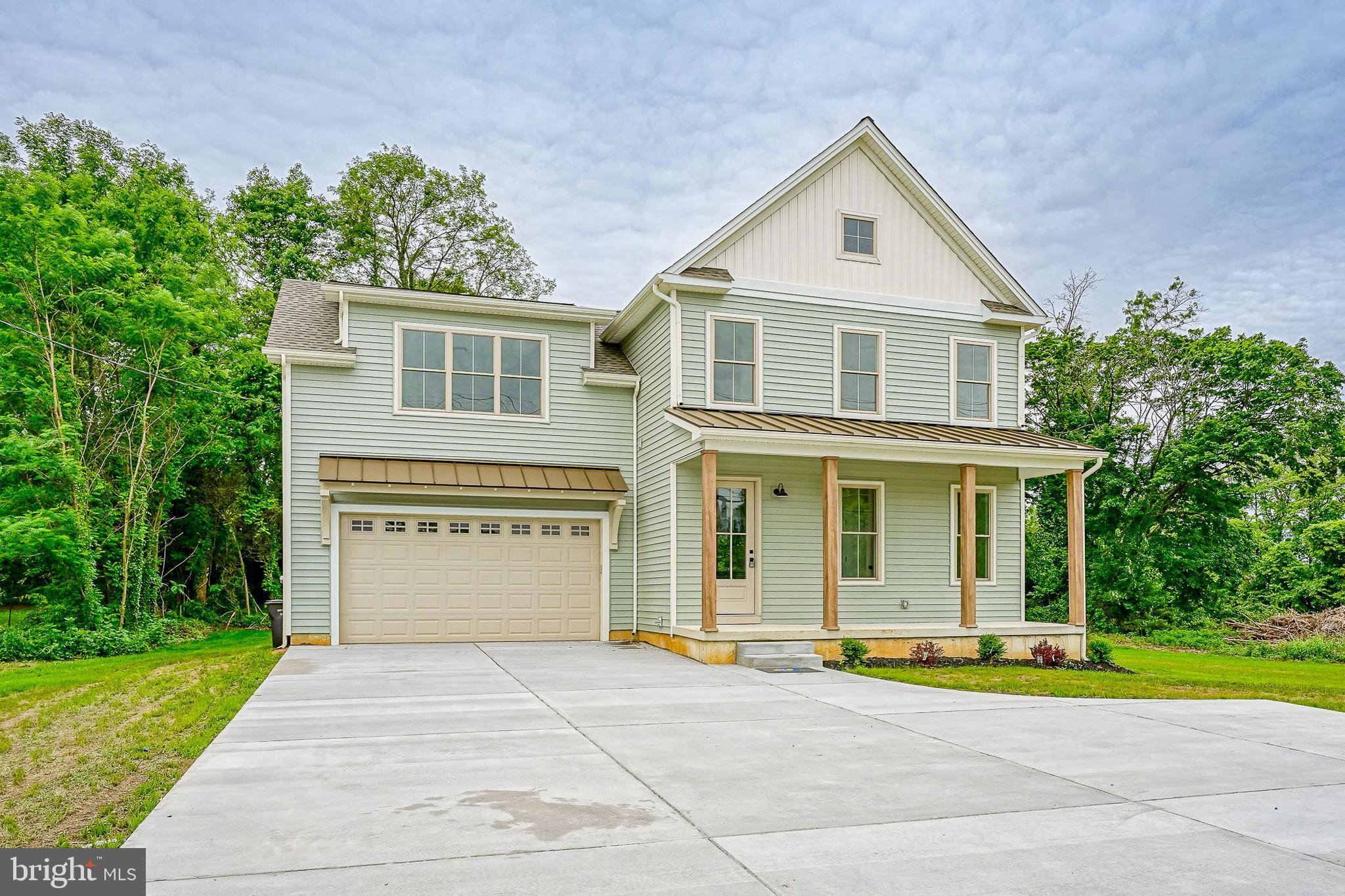 35 West Cohawkin Road Clarksboro, NJ 08020 - Photo 2 of 30 a front view of a house with a yard and garage