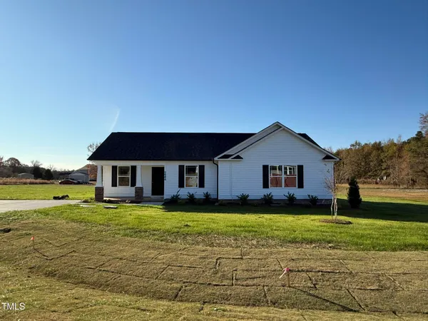 a view of a house with a big yard