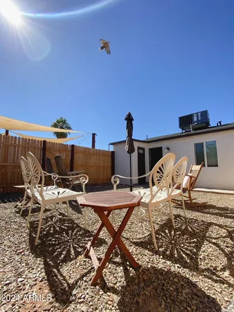 a view of a terrace with furniture