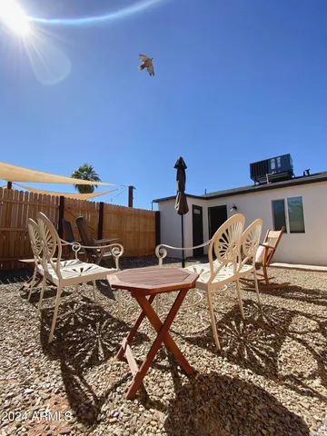 a view of a terrace with furniture