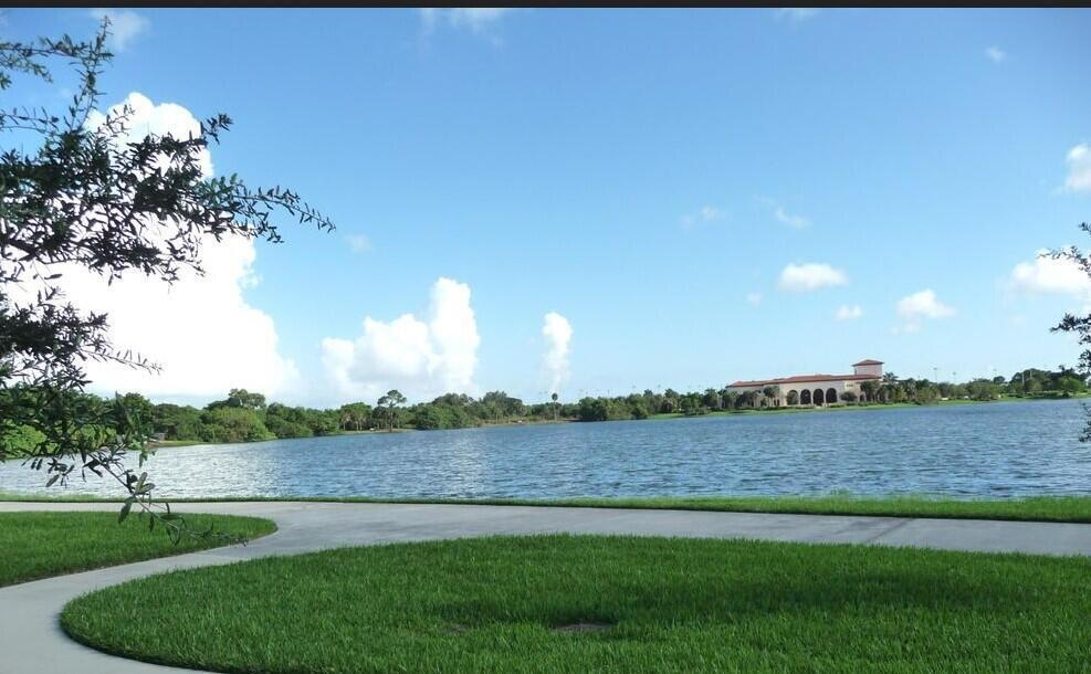 a view of a lake with a big yard