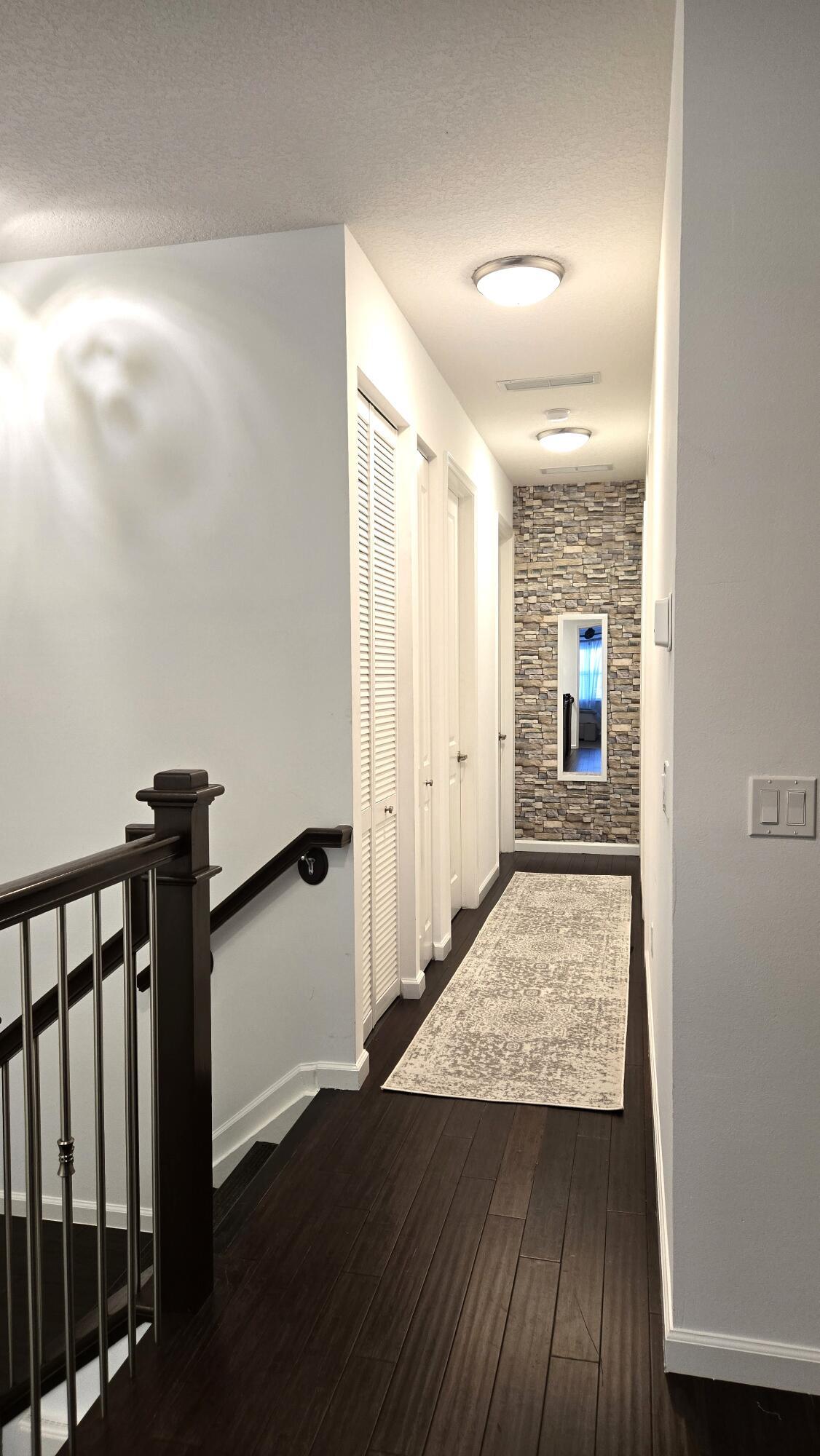 4858 Northwest 16th Terrace Boca Raton, FL 33431 - Photo 15 of 38 a view of hallway with wooden floor