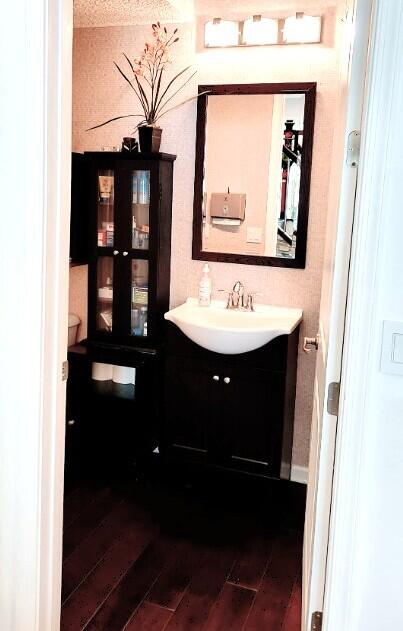 4858 Northwest 16th Terrace Boca Raton, FL 33431 - Photo 9 of 38 a bathroom with a sink and a mirror