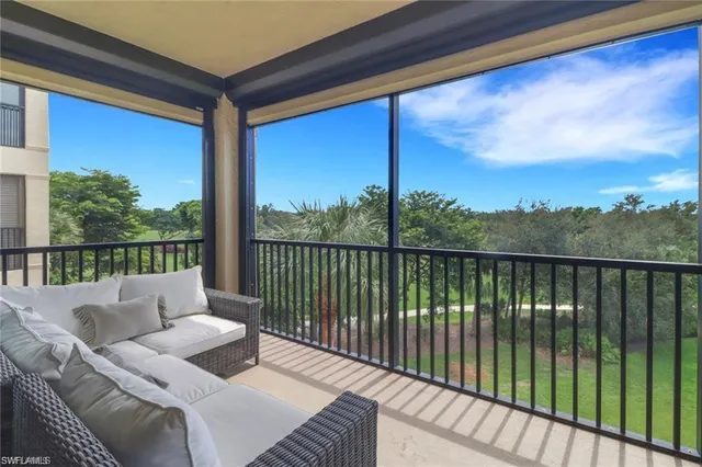 a balcony with chairs