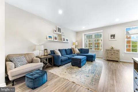 a living room with furniture or couch and a window