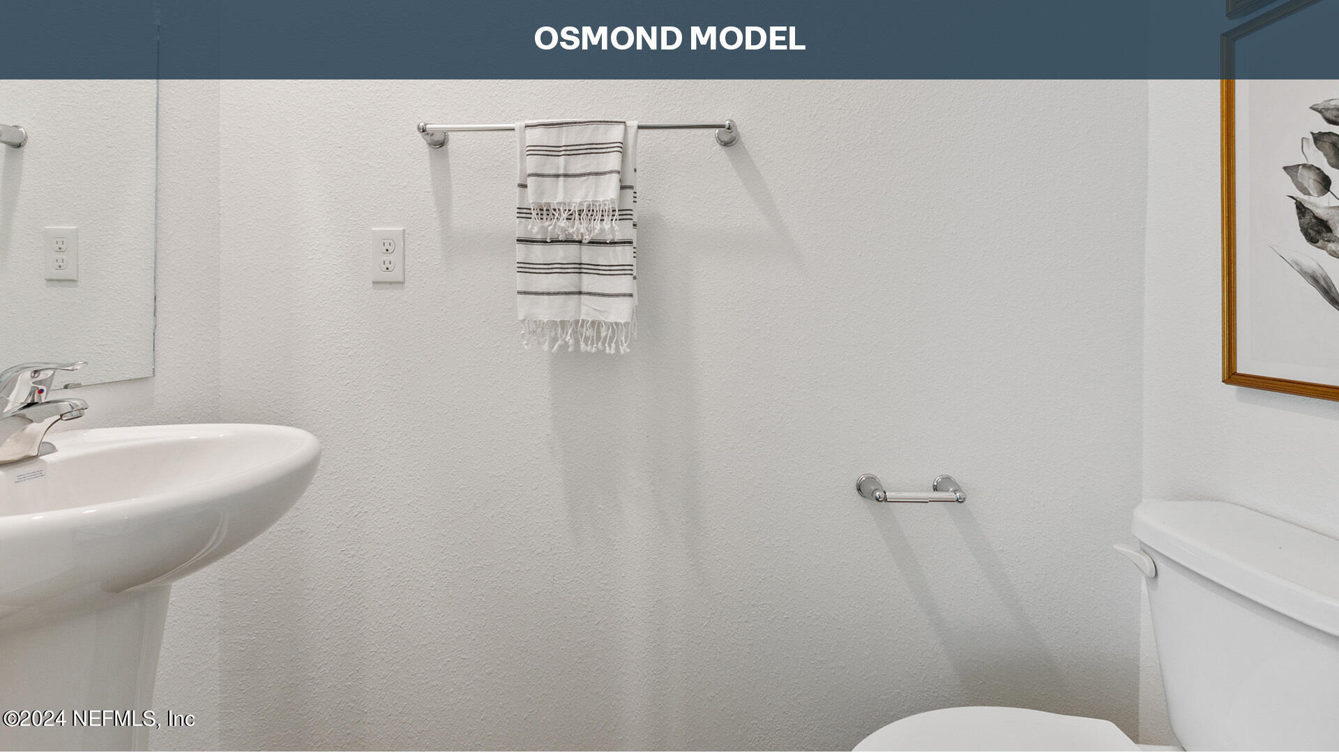 84 Montellano Road St. Augustine, FL 32084 - Photo 19 of 55 a bathroom with a sink and a toilet