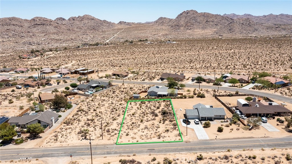 7800 Sunset Road Joshua Tree, CA 92252 - Photo 2 of 15 an aerial view of house with yard