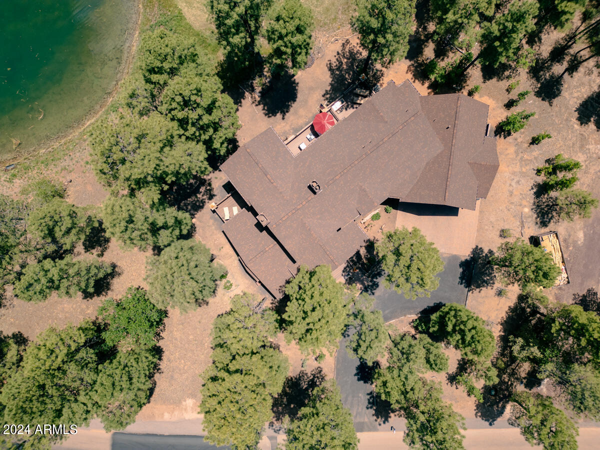 4051 West Falling Leaf Road Show Low, AZ 85901 - Photo 11 of 77 an aerial view of a house with a yard