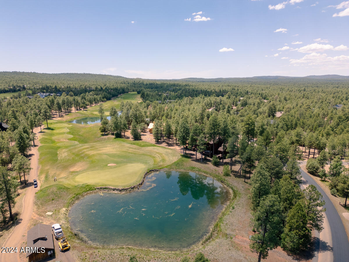 4051 West Falling Leaf Road Show Low, AZ 85901 - Photo 12 of 77 a view of a lake in middle of the town