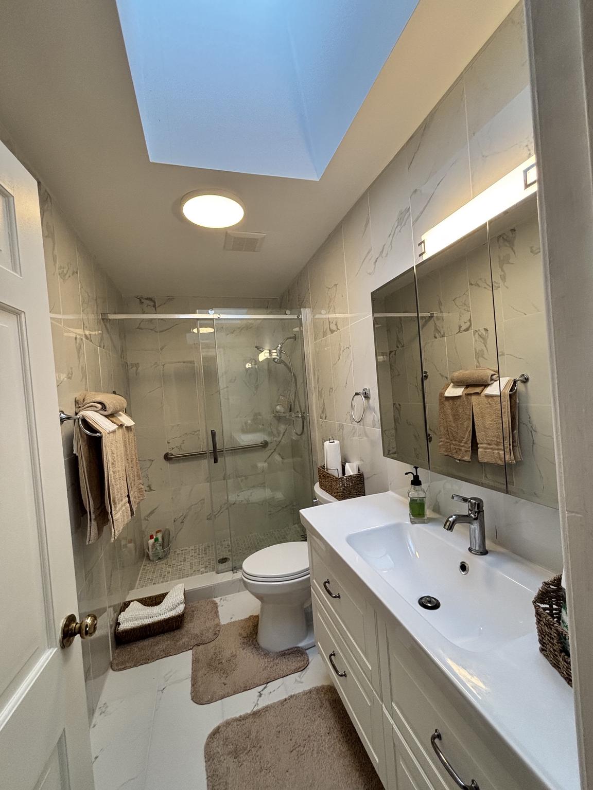 608 6th Place Southwest Washington, DC 20024 - Photo 42 of 65 Enter this bright and modern bathroom oasis.