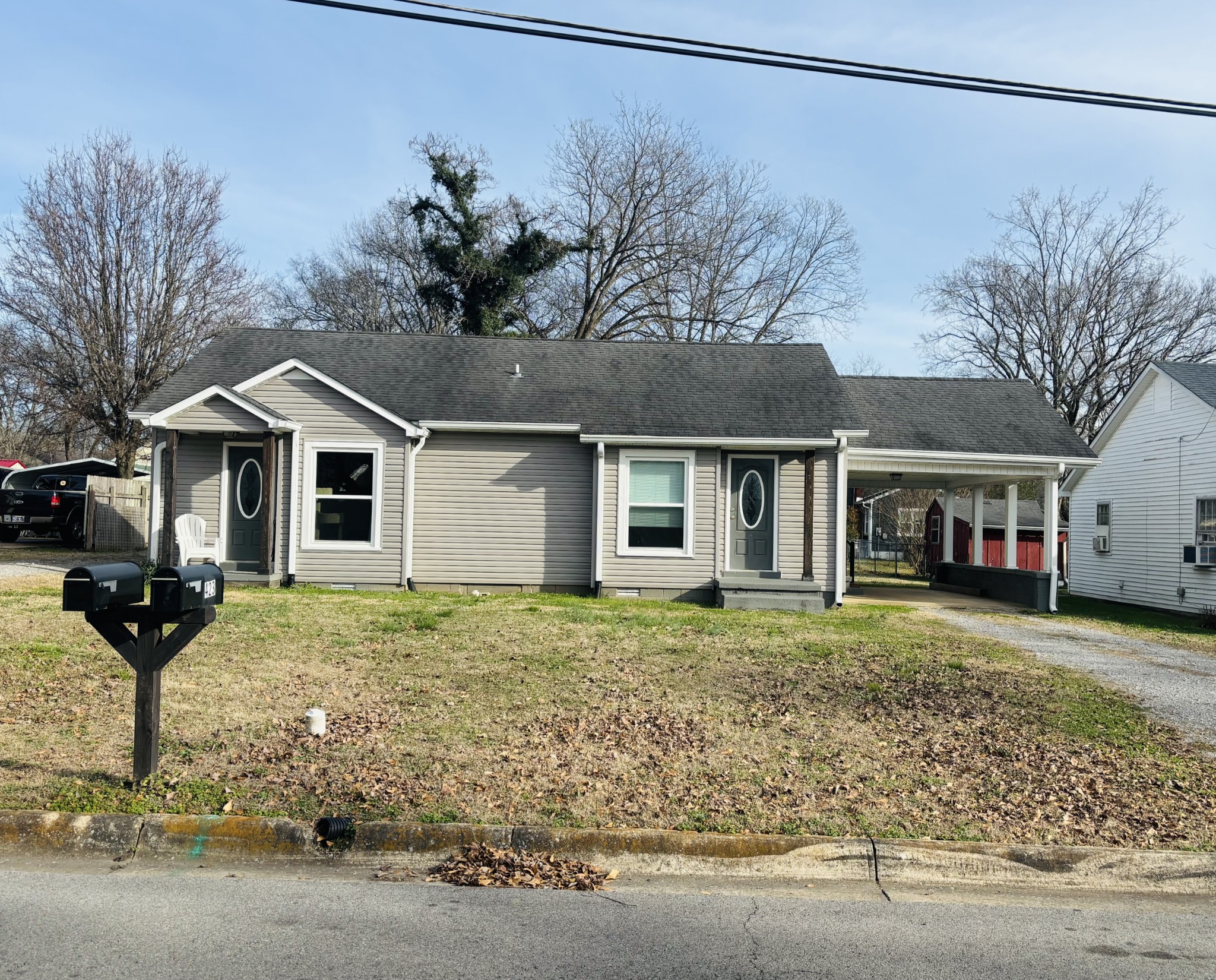 423 South Cedar Lane Pulaski, TN 38478 - Photo 1 of 9 a front view of a house with garden