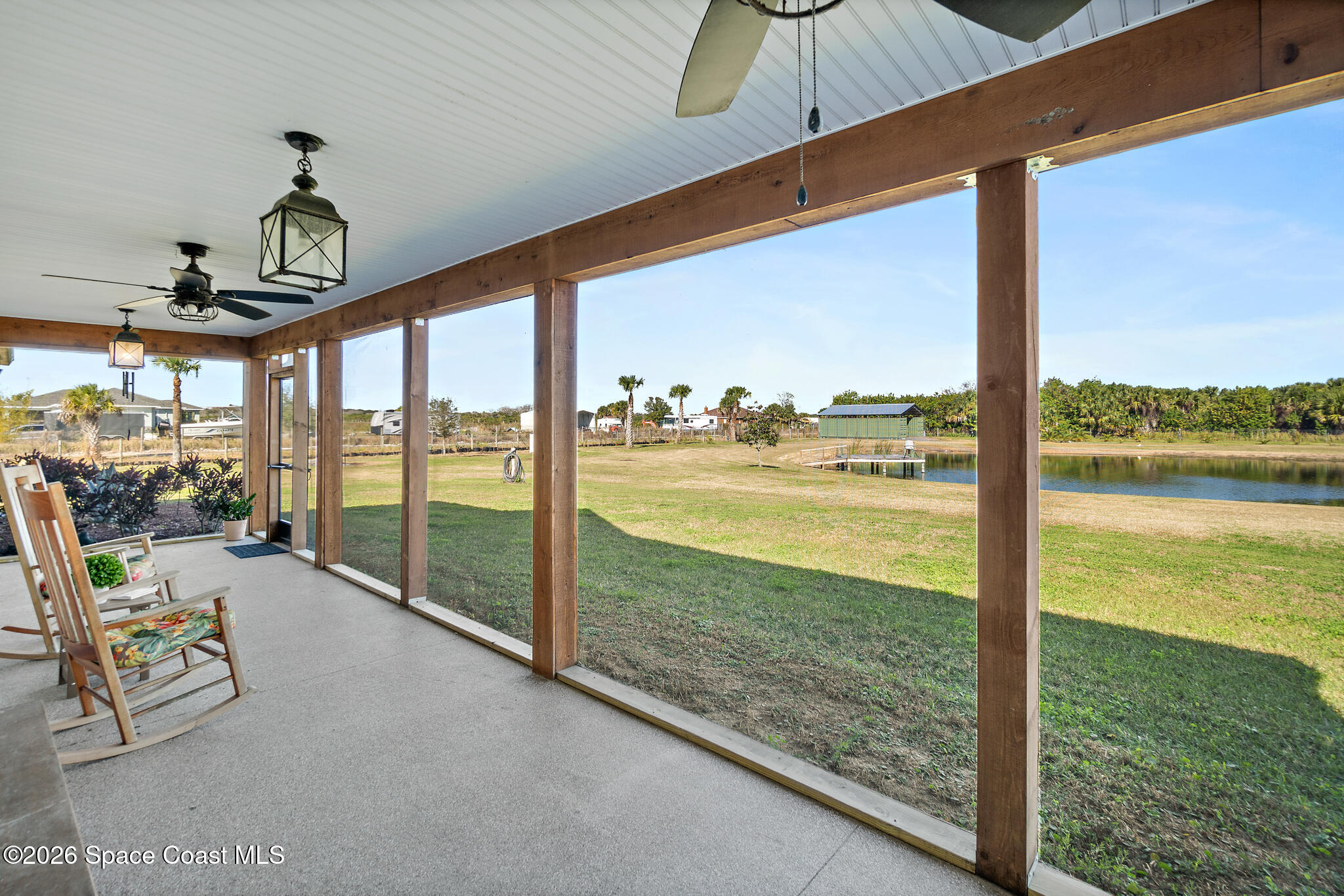 3440 Hammock Road Mims, FL 32754 - Photo 16 of 56 Screened Front Porch