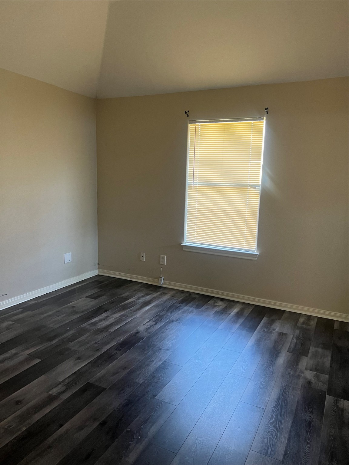 4221 Clover Street Houston, TX 77051 - Photo 5 of 6 an empty room with wooden floor and a window