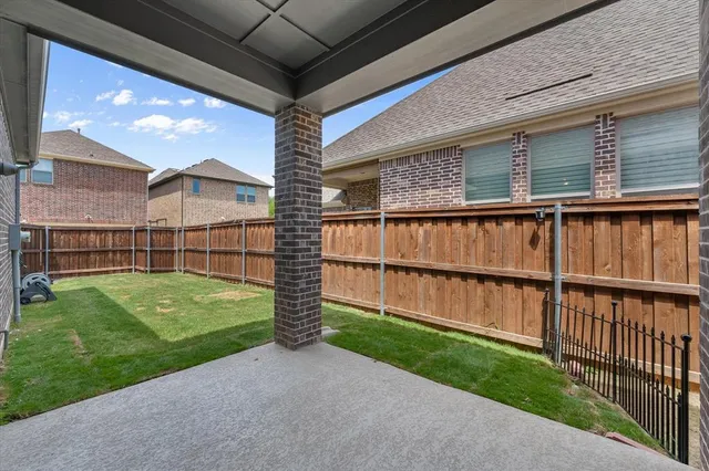 a view of a backyard with a garden