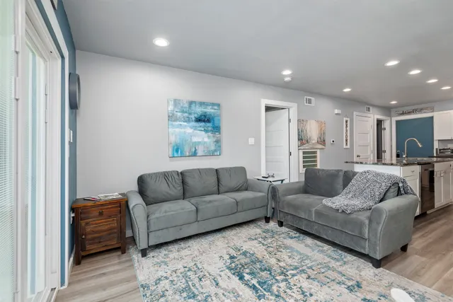 a living room with furniture and a couch