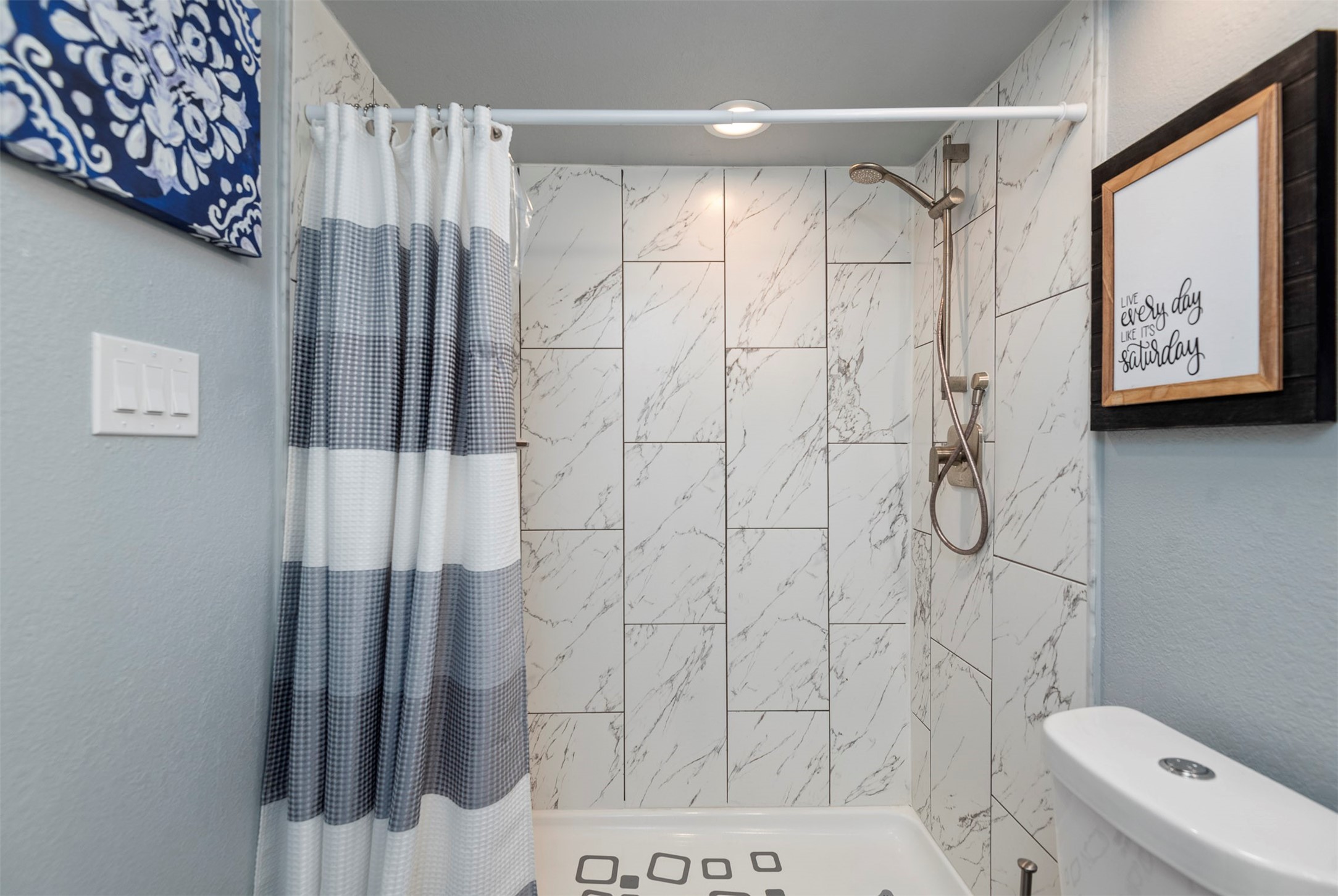 13151 Walden Road, Unit 195 Montgomery, TX 77356 - Photo 22 of 35 a bathroom with a shower and toilet
