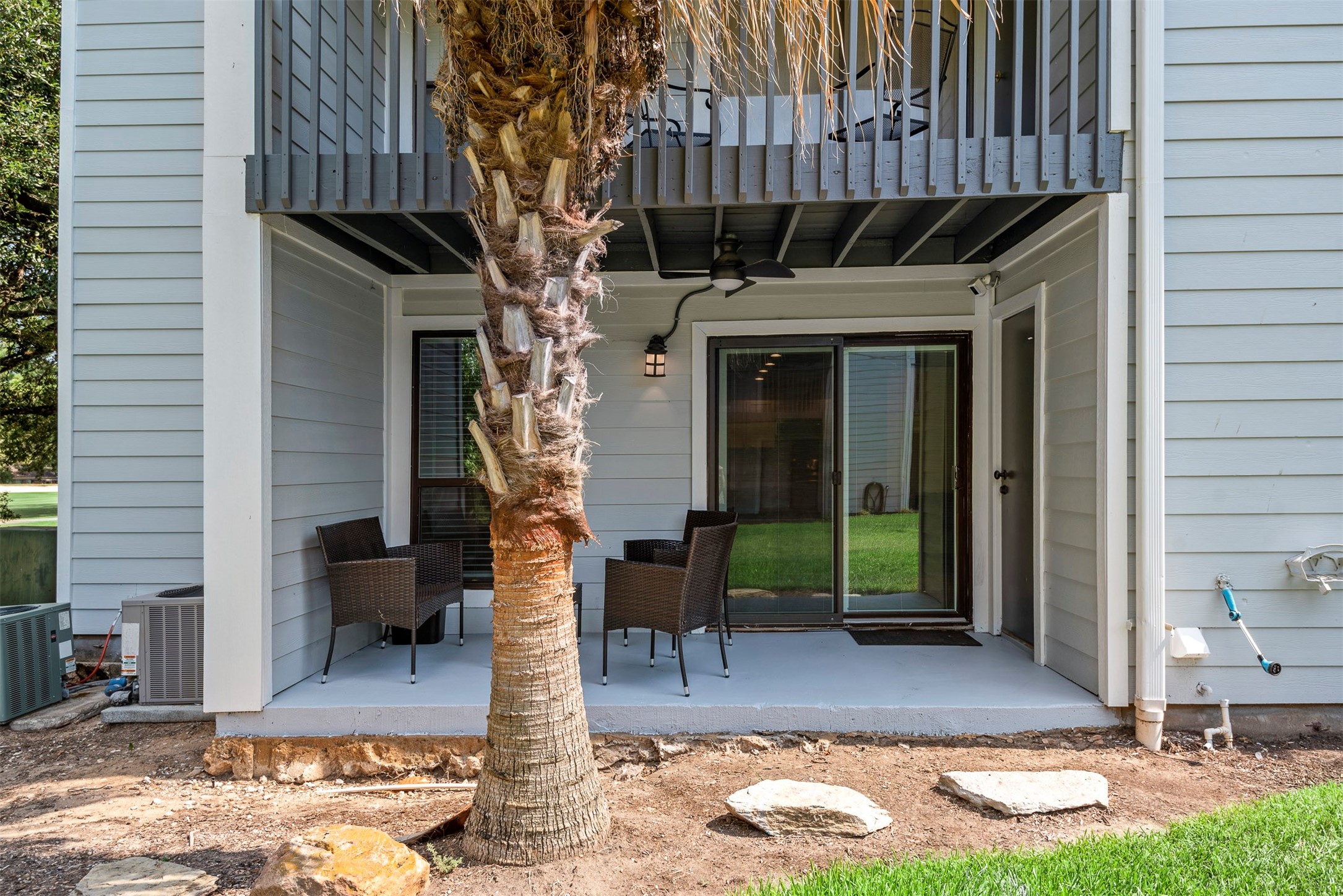 13151 Walden Road, Unit 195 Montgomery, TX 77356 - Photo 31 of 35 a view of a porch with furniture and floor to ceiling window