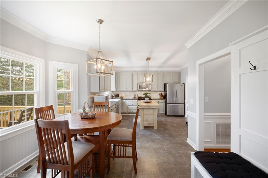 8105 Slane Court Clemmons, NC 27012 - Photo 7 of 40 breakfast area into kitchen