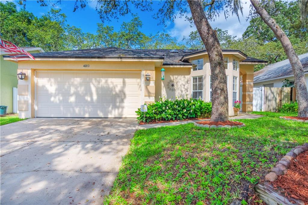 4013 Fontana Place Valrico, FL 33596 - Photo 1 of 1 front view of a house with a yard