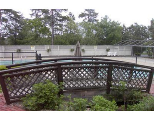 10 Shellback Way, Unit 10 Mashpee, MA 02649 - Photo 12 of 12 a view of a backyard