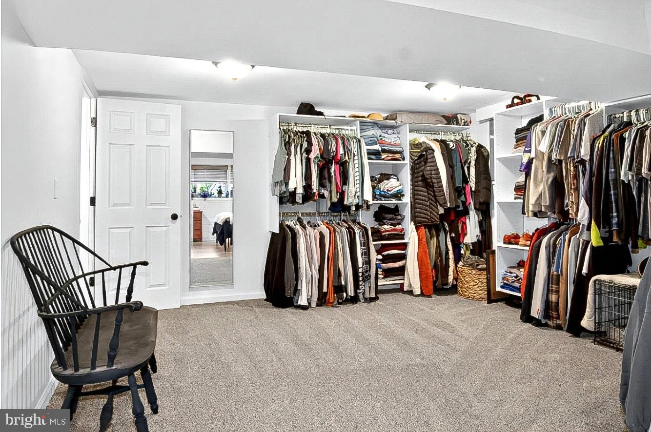 9263 East Springfield Road Seven Valleys, PA 17360 - Photo 13 of 20 a view of walk in closet with clothes and shoes