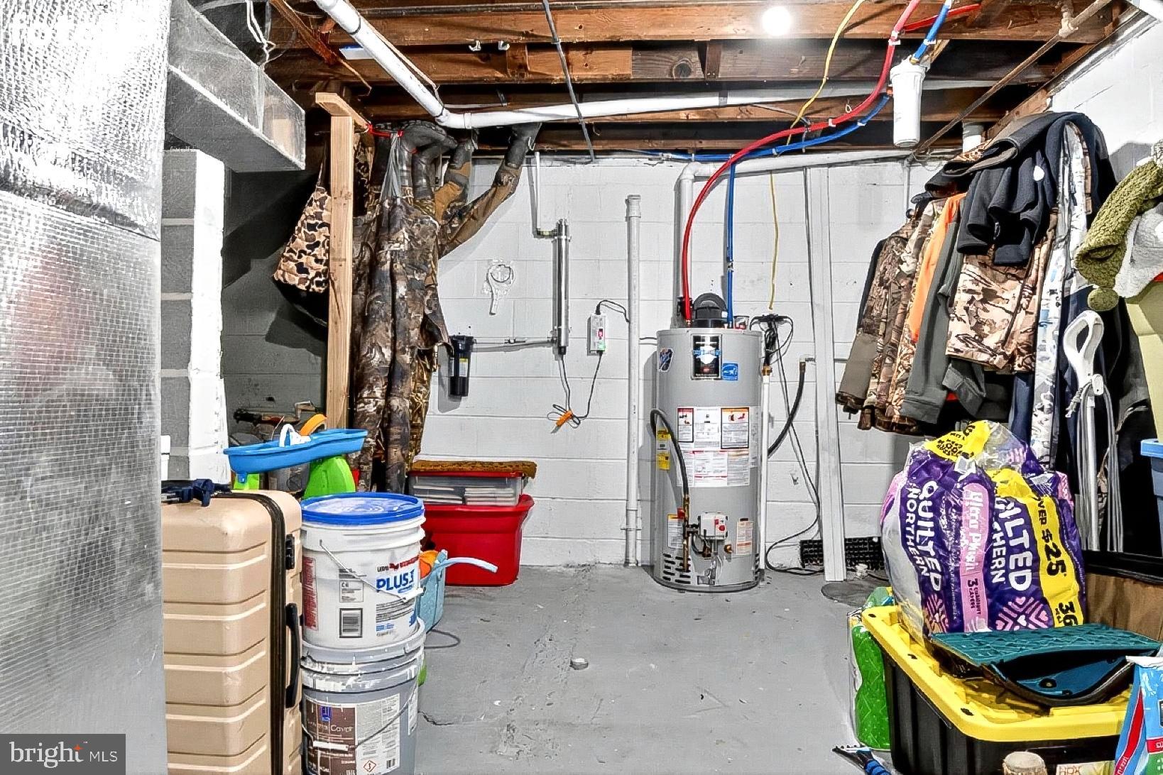 9263 East Springfield Road Seven Valleys, PA 17360 - Photo 16 of 20 a view of walk in closet with clothes and shoes