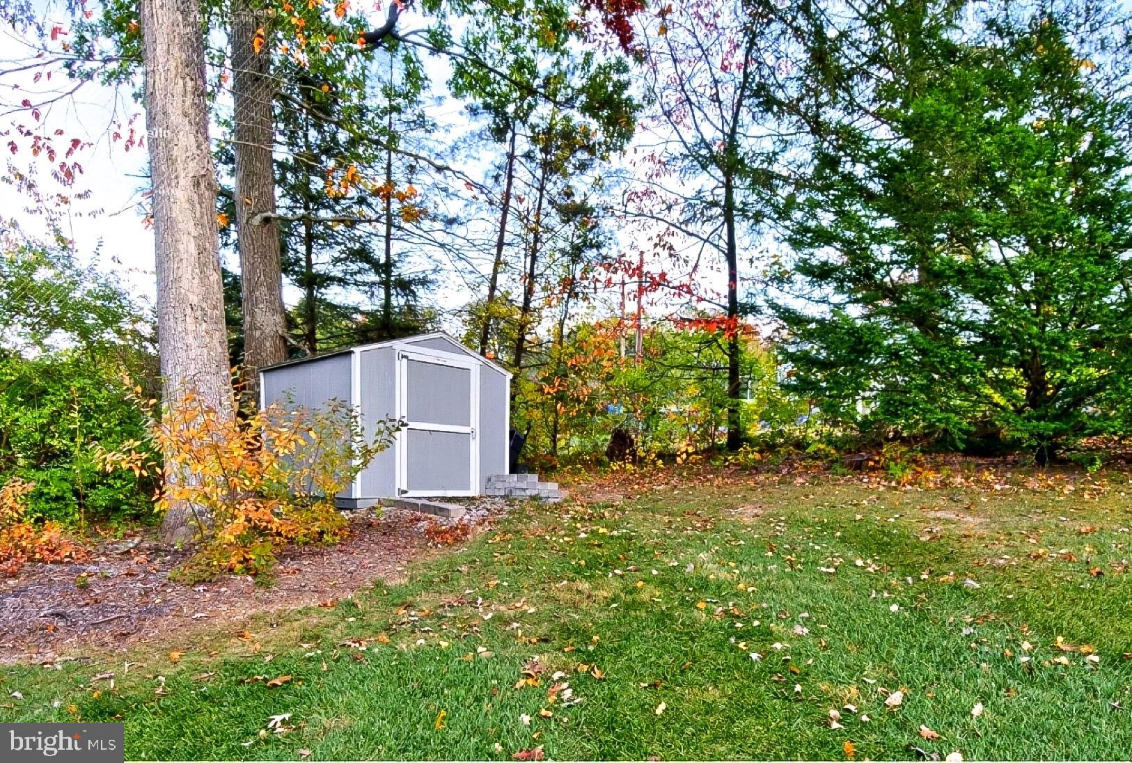 9263 East Springfield Road Seven Valleys, PA 17360 - Photo 20 of 20 a top view of a house with a yard and large tree