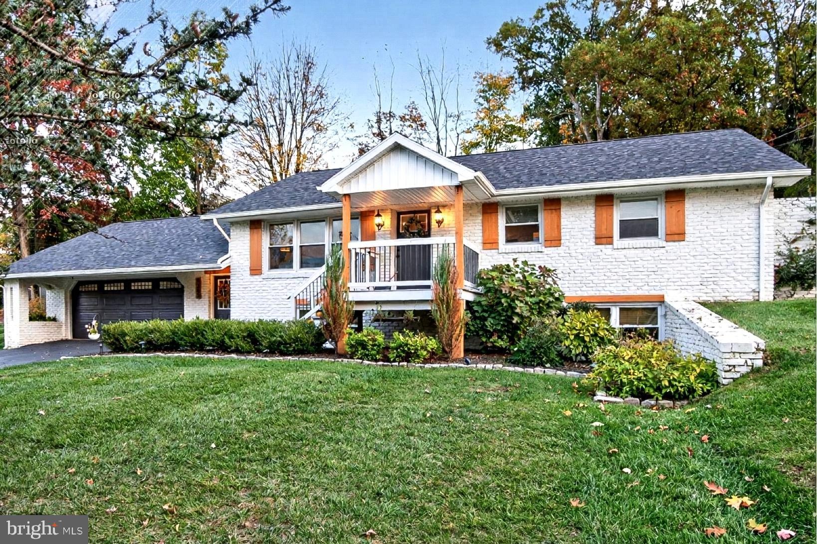 9263 East Springfield Road Seven Valleys, PA 17360 - Photo 2 of 20 a front view of a house with a yard