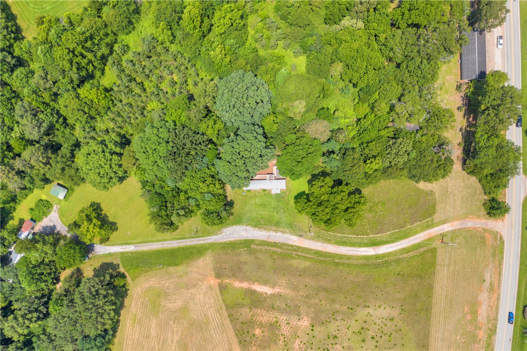 150 Newberry Road Walhalla, SC 29691 - Photo 47 of 47 Discover a private retreat nestled among lush woodlands, offering ample green space and a serene natural setting.