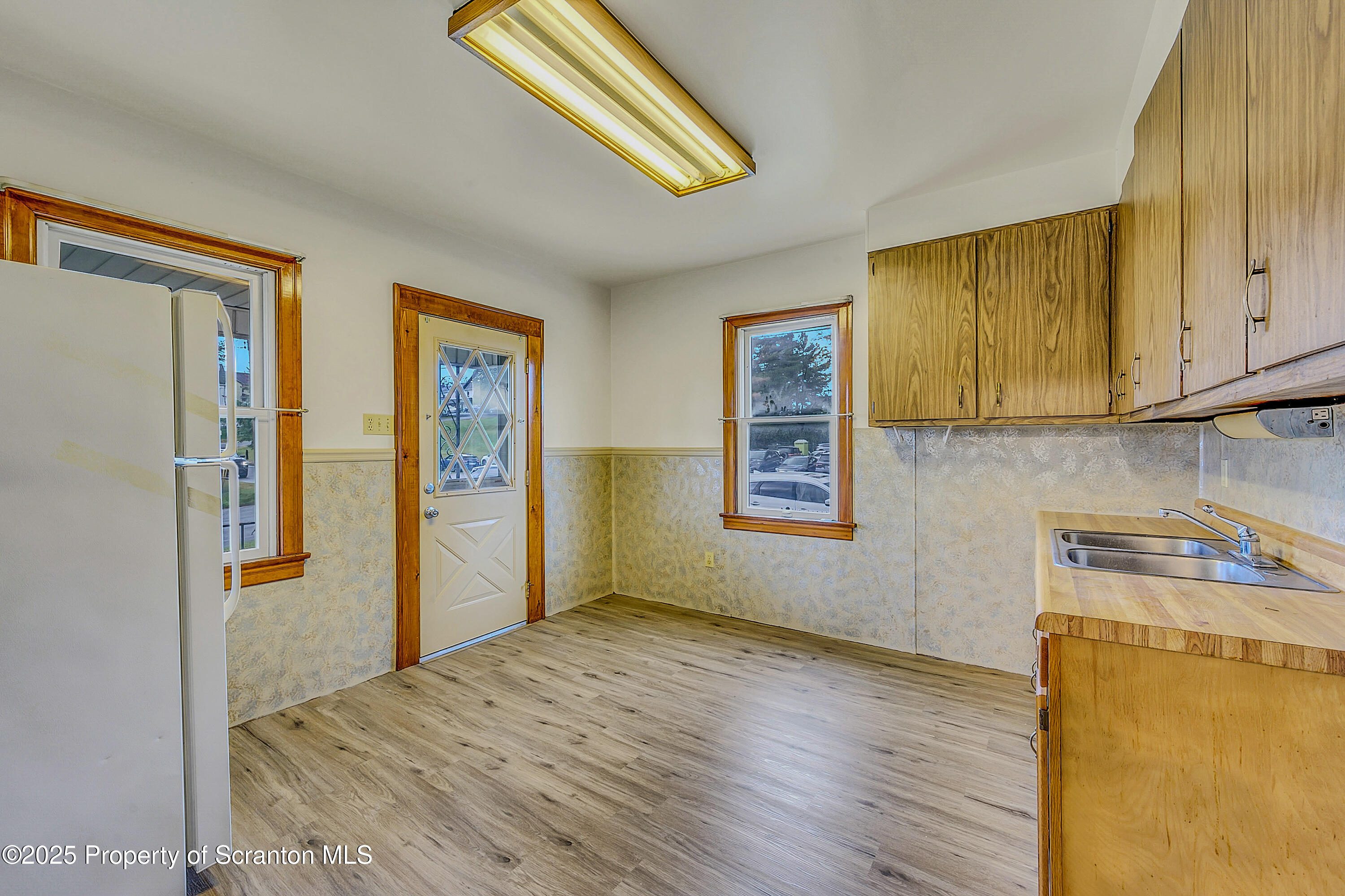443 14th Avenue, Unit REAR Scranton, PA 18504 - Photo 6 of 16 a view of hallway with wooden floor