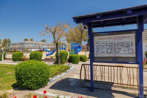 a view of a street with sitting area